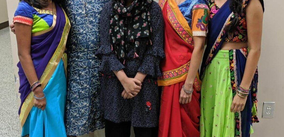 Noor with the Patel Family