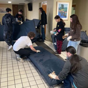 CS - Rescue Mission - 9 Students Volunteering at the Rescue Mission