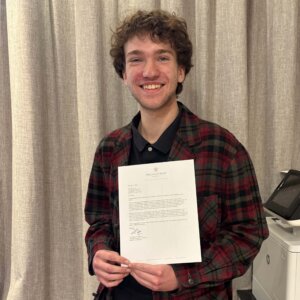 Tyler with his certificate